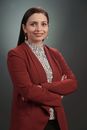 Portrait of a Woman in a Reddish Suit