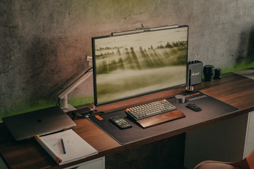 Computer and Laptop on the Desk 