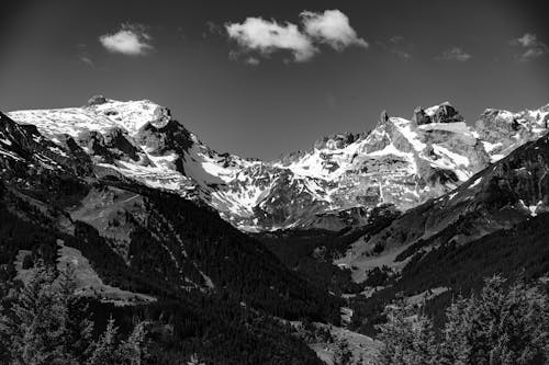 Grayscale Photo of Snow Capped Mountain 
