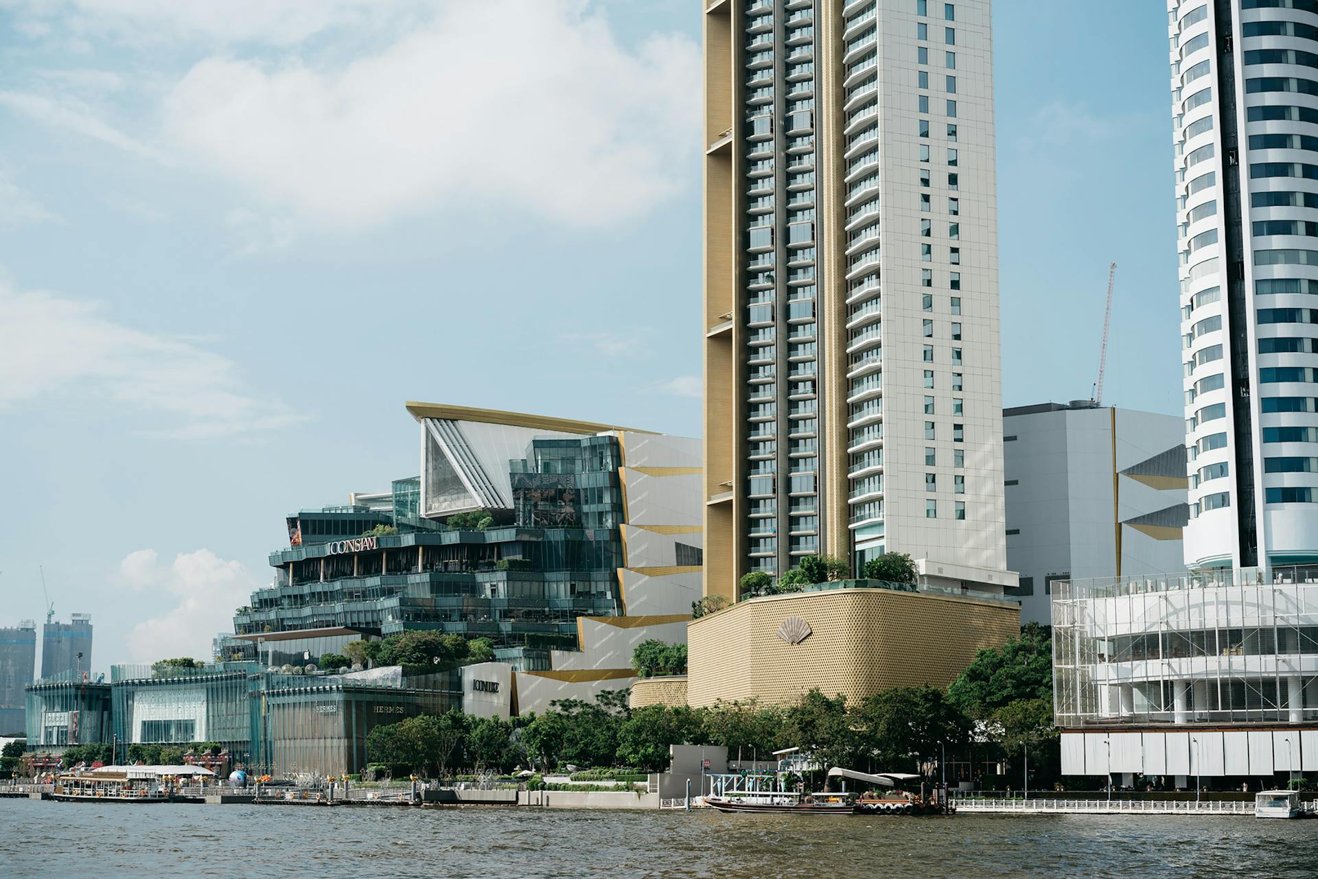 Skyline of Bangkok featuring modern architecture and the riverside ICONSIAM complex.