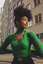 Portrait of Woman in Green Sweater