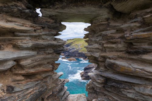 View of the Seashore from the Ruins of a Castle in Tintagel, Cornwall, England, UK