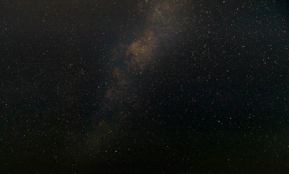 A breathtaking view of the starry night sky showcasing the Milky Way in all its celestial beauty.