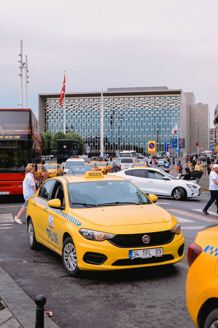 Yellow Taxis On Busy City Street