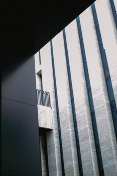 Exploring contrasting geometric shapes in modern architecture.