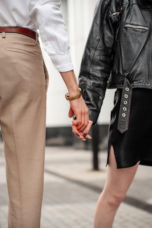 Free Close-up of Man and Woman Holding Hands  Stock Photo