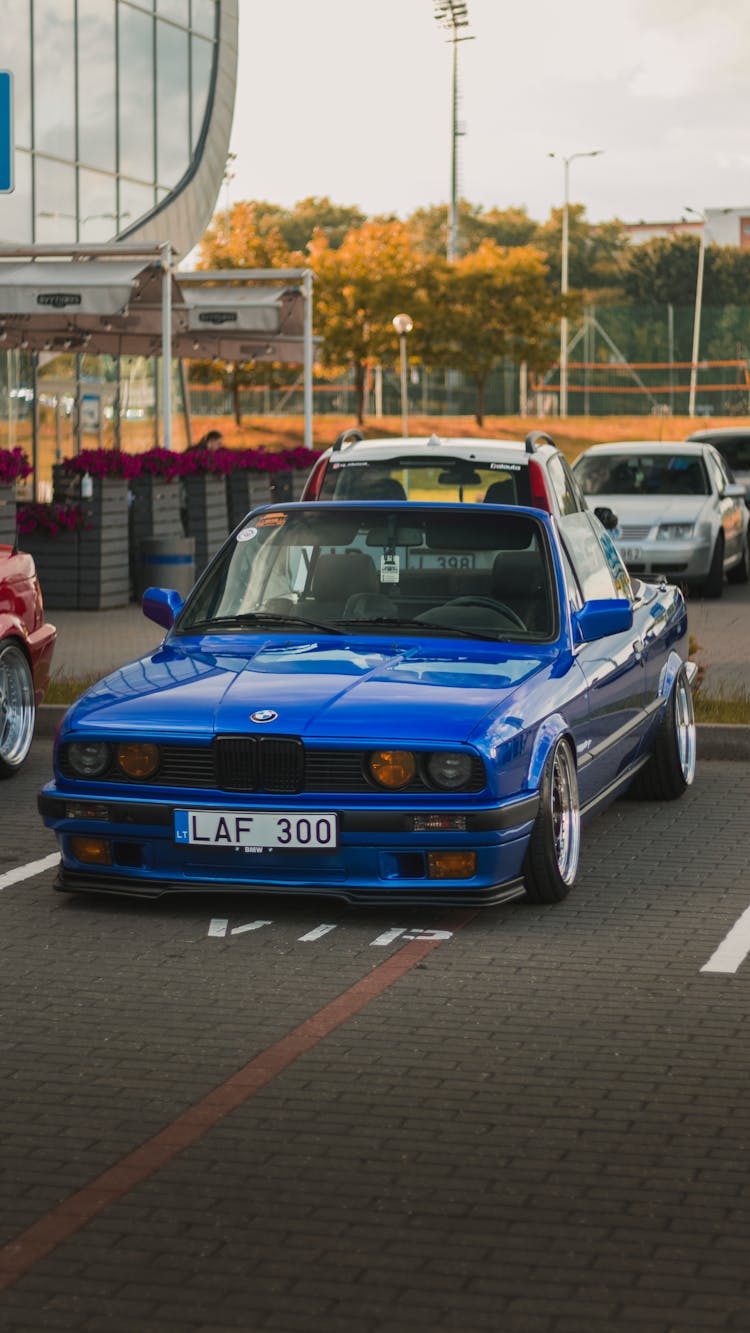 Blue BMW Car Parked On VIP Parking 