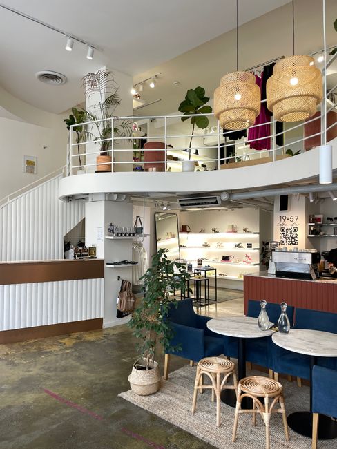 Modern café interior in Kyiv with stylish seating and decorative lighting.