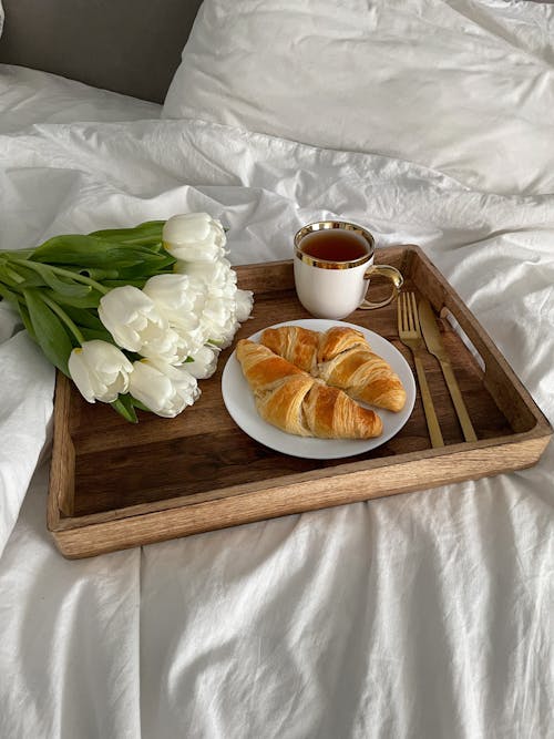 Free Breakfast in Bed With White Tulips Stock Photo