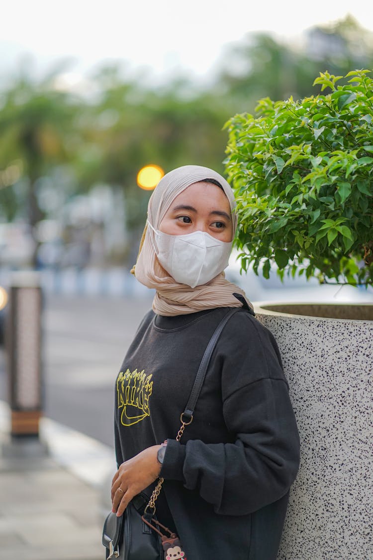 Woman In Mask Posing