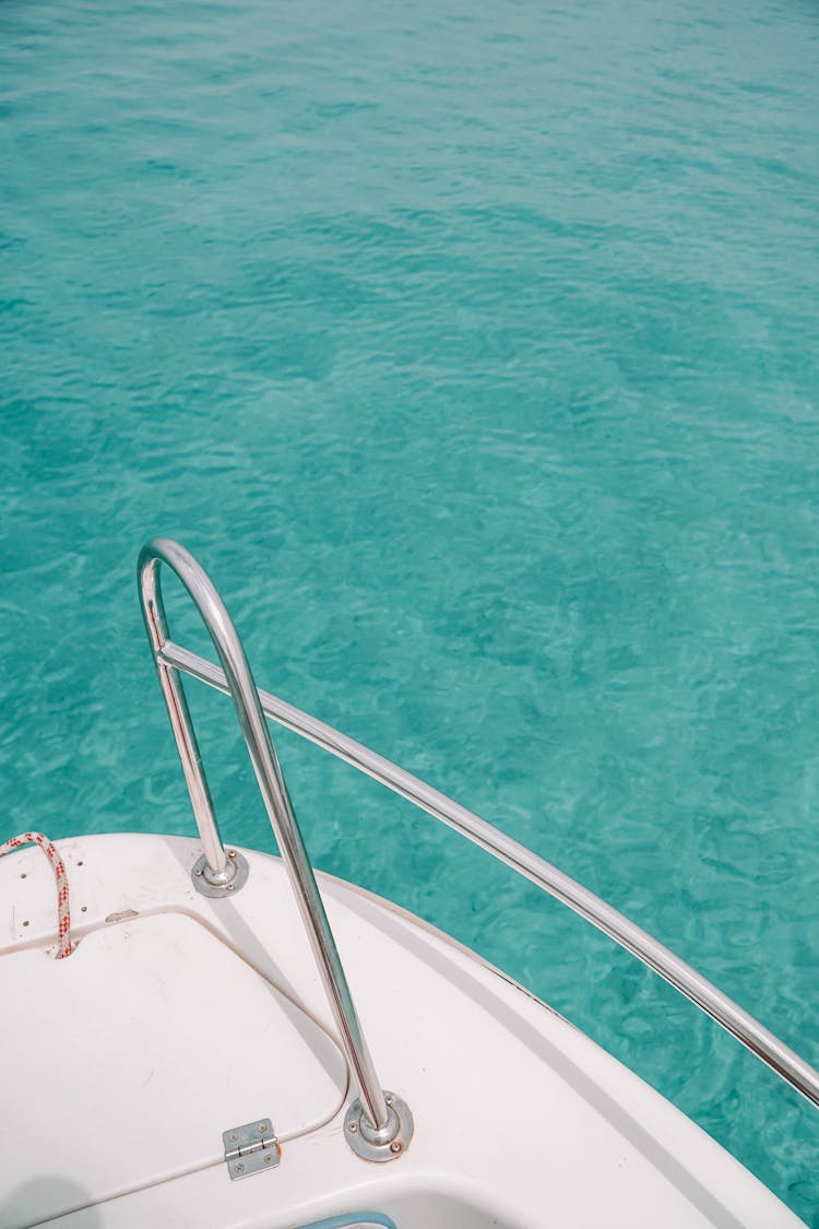 White Boat On Blue Water