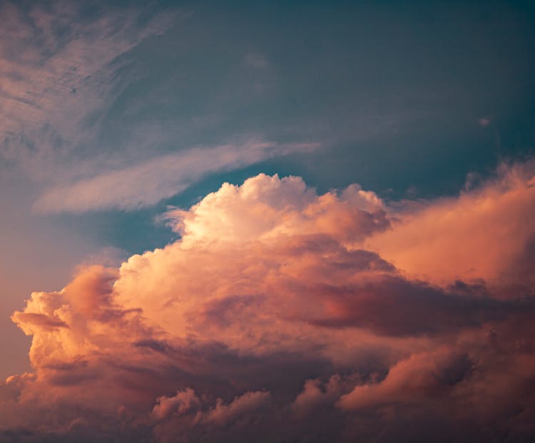 Clouds In The Sky During Sunset