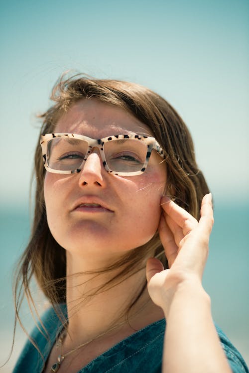 Woman Posing with Hand on Cheek