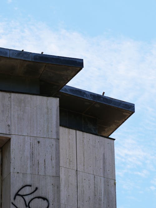 Foto profissional grátis de céu azul, cobertura, estrutura de concreto