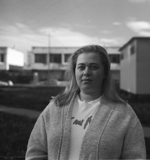 Grayscale Photo of Woman in Cardigan 