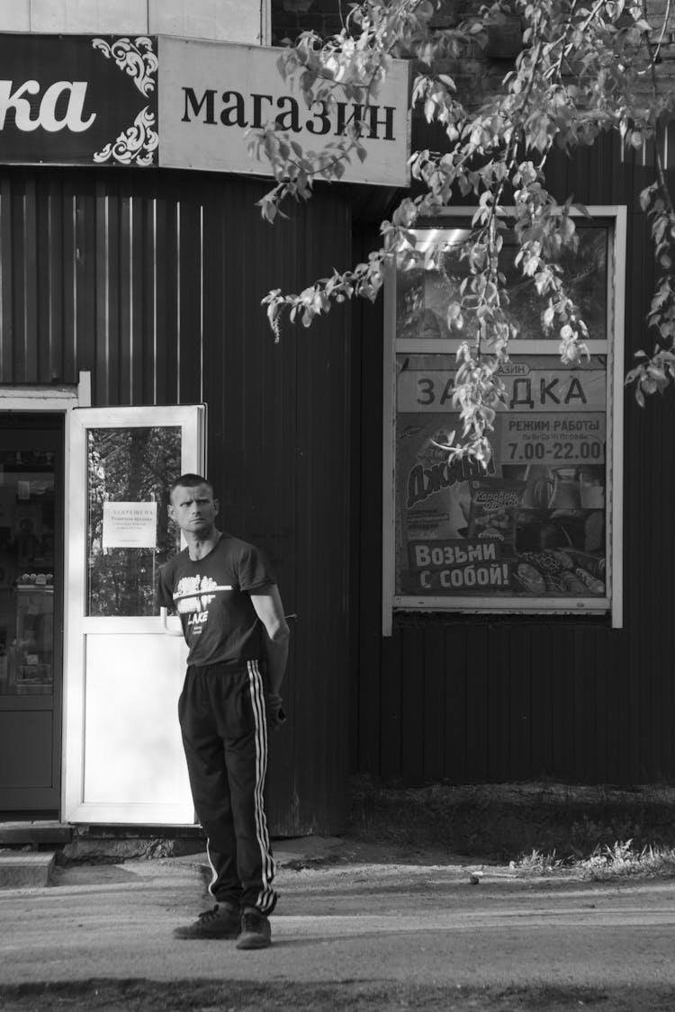 Man Standing Near Store