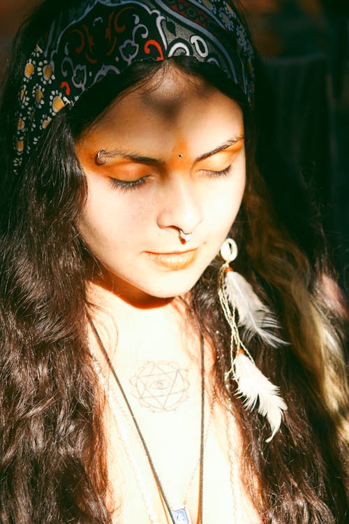 Portrait of Brunette Woman Wearing Headscarf in Sunlight 