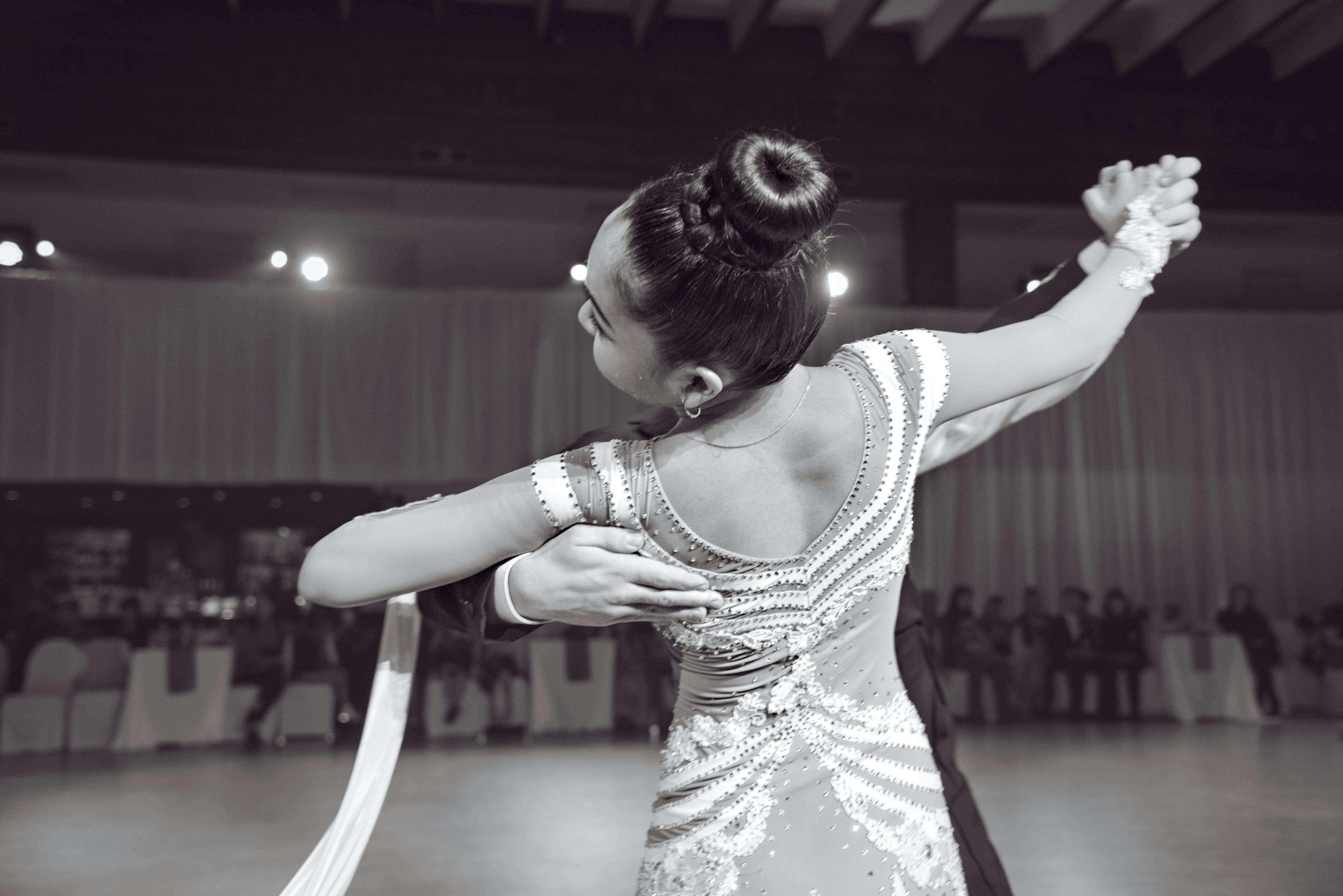 Graceful ballroom dance performance capturing elegance and skill, indoors in Vancouver.
