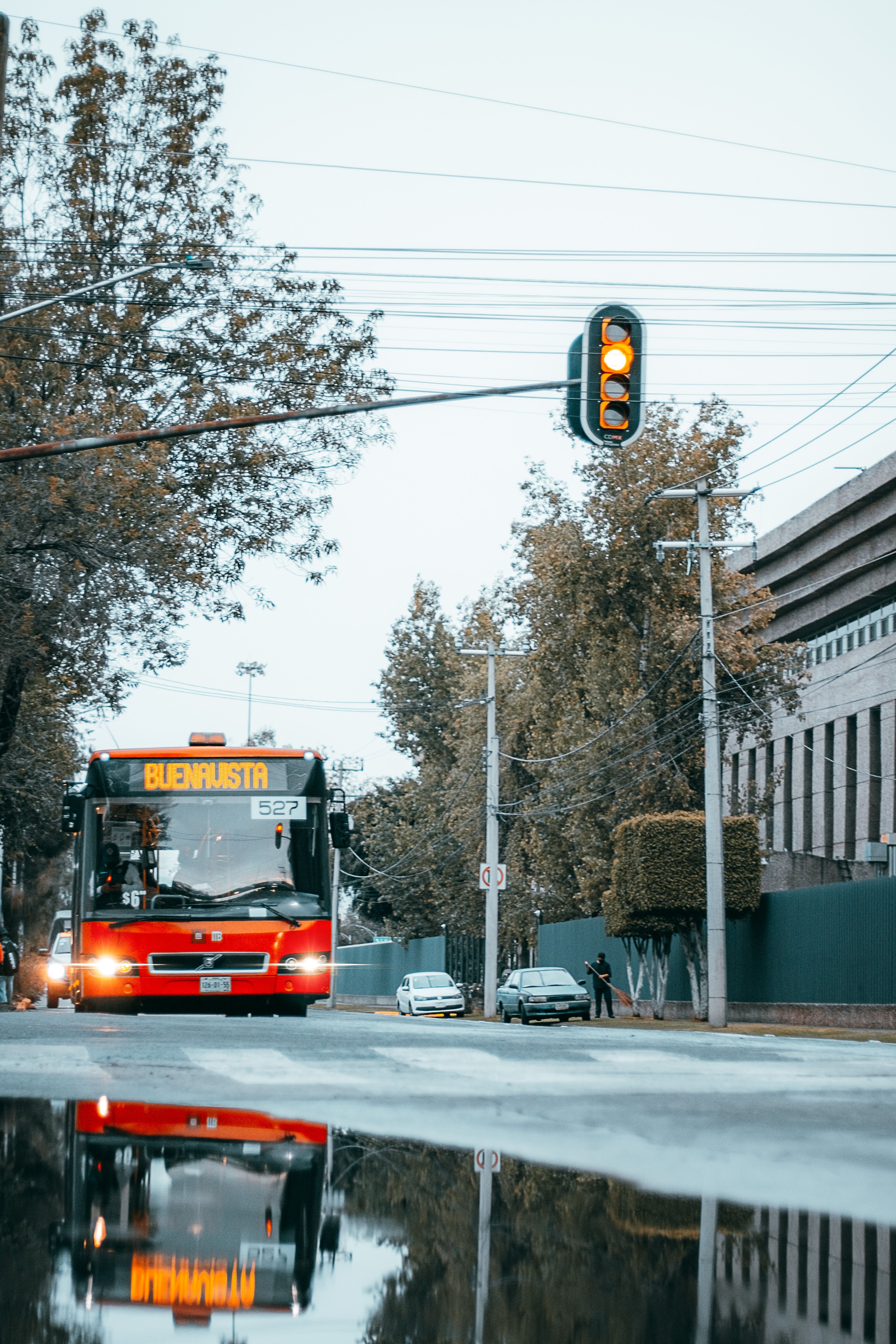 Red and Black Bus on Road · Free Stock Photo
