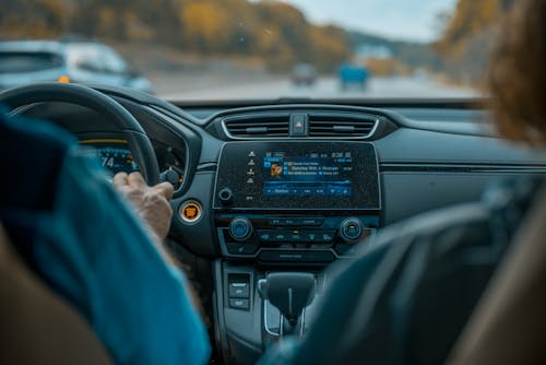 Free A Person Driving a Car Stock Photo