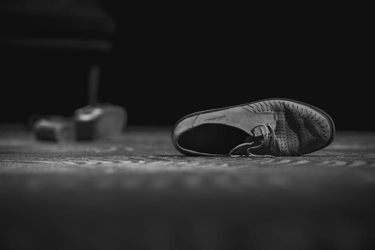 Grayscale Photo Of A Shoe 