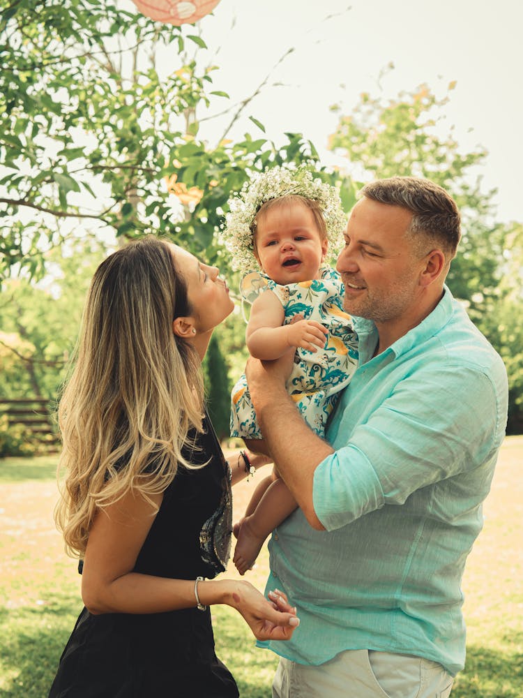 Happy Parents With Baby