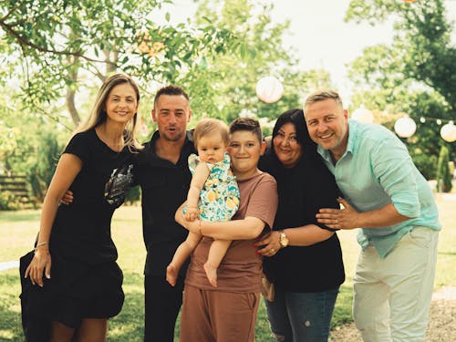 A Family Grouping Together with the Kids