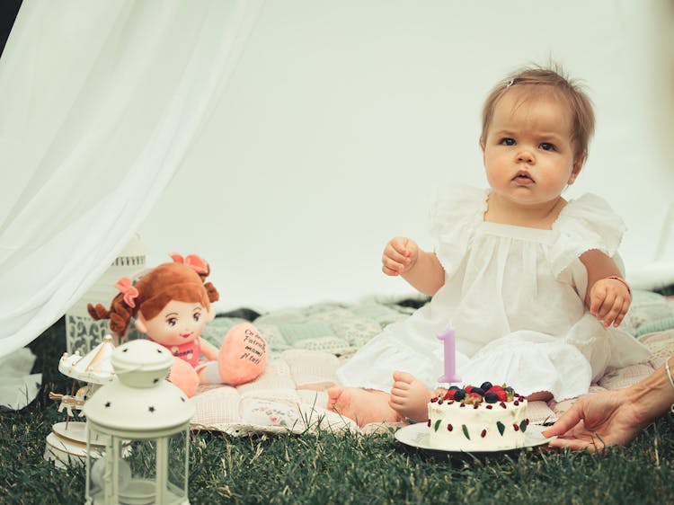 Baby Girl With Birthday Cake