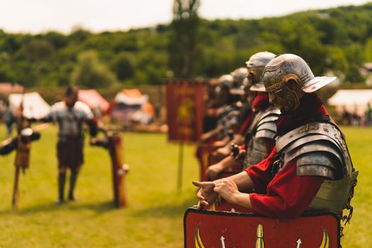 Men in Roman Legionaries Armors