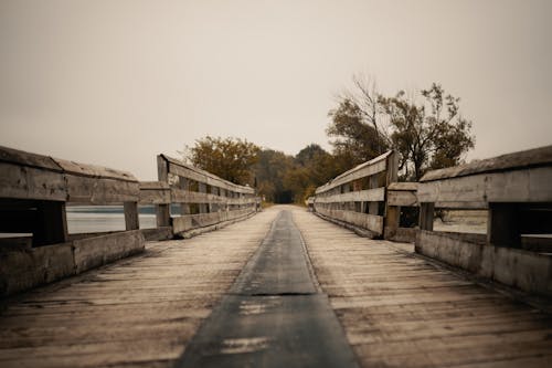 Wooden Bridge Across a River