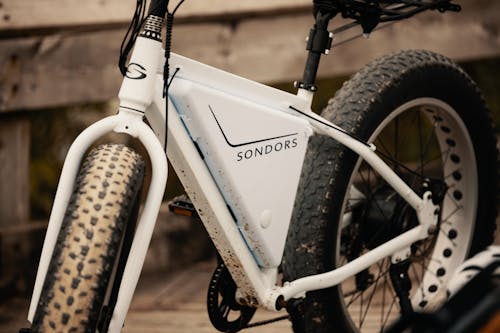 Free White and Black Bicycle on Brown Dirt Stock Photo