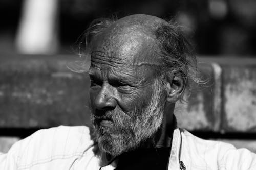 Grayscale Photo of an Elderly Man with Facial Hair