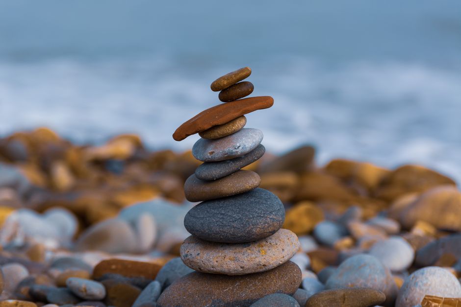 three stacked stones balance