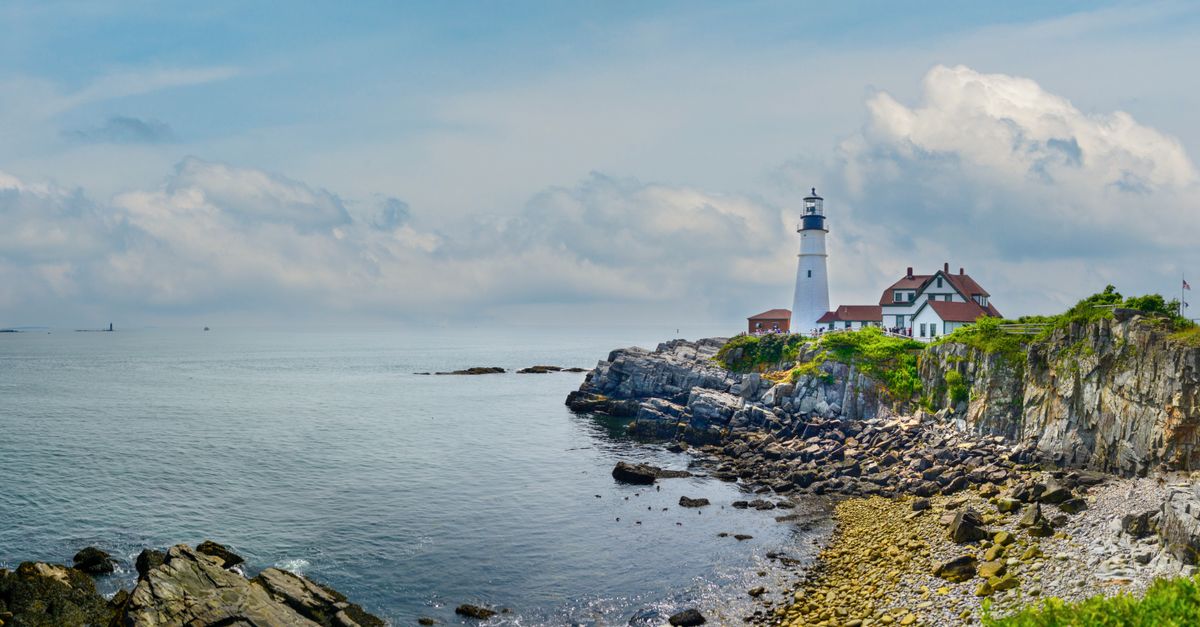 Panoramic view of Portland Head Light on Maine's rugged coastline