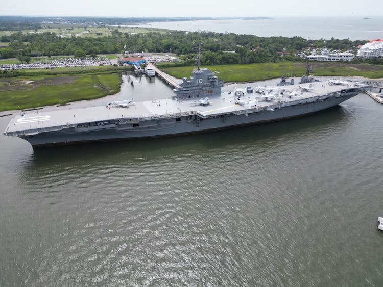 Drone Shots Of USS Yorktown Aircraft Carrier In The Harbor