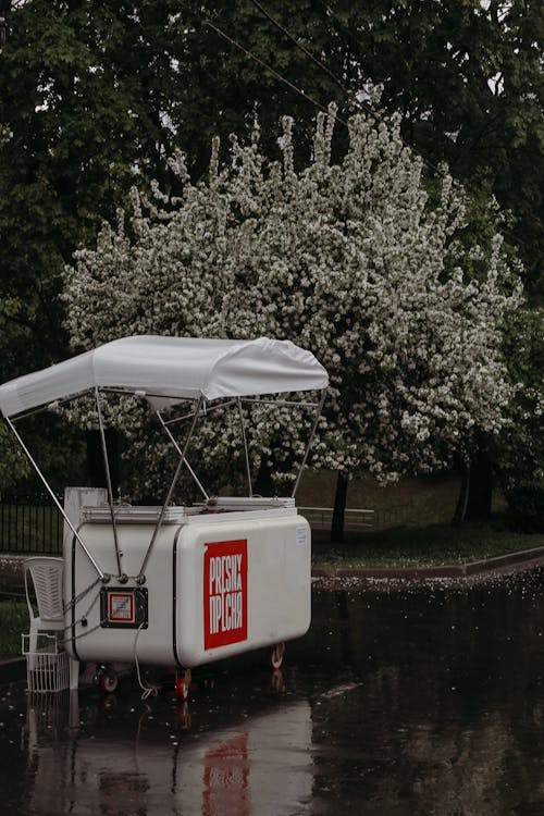 Free Photo of a Mobile Stall Standing in a Park Stock Photo