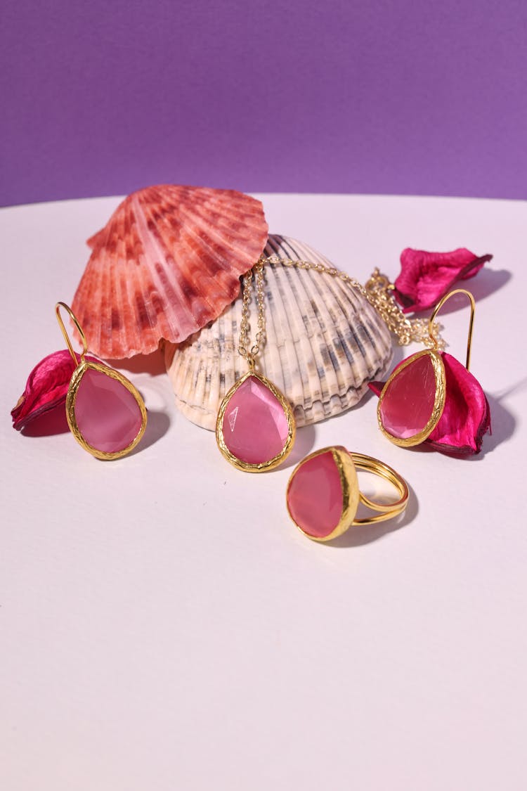 Still Life With Pink Golden Jewellery And Shells