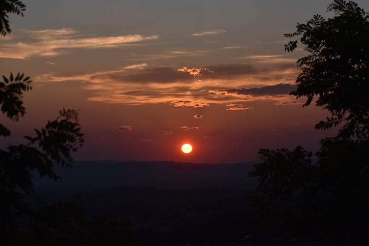 Sun Setting In Dramatic Sky