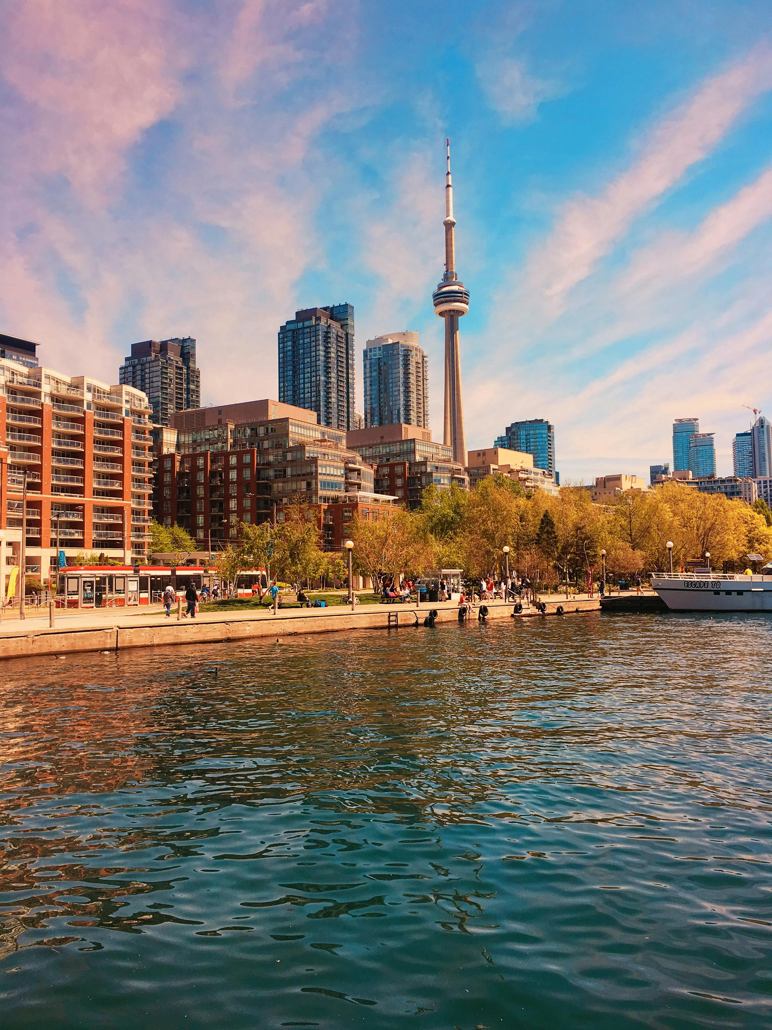 Skyscraper Buildings Near Body of Water · Free Stock Photo