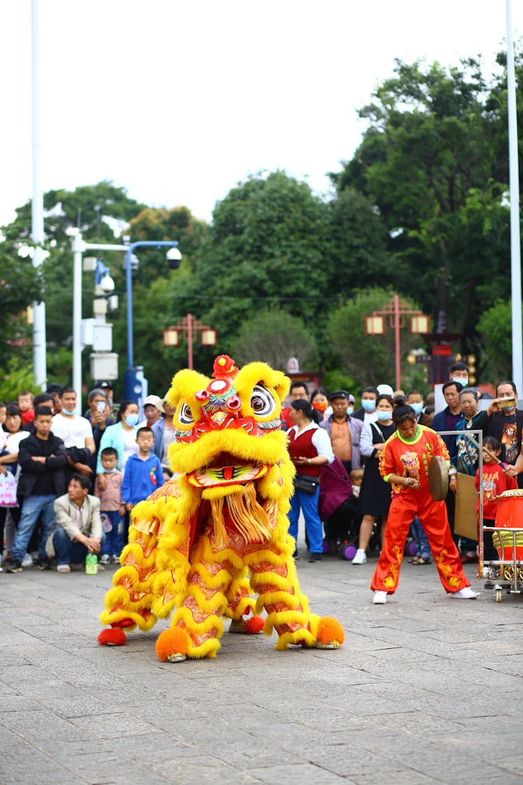 People Watching Performance On Festival