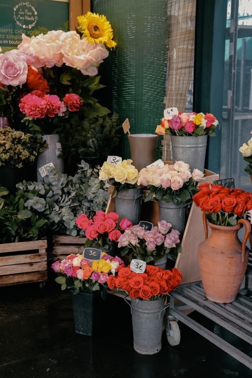 Free Colorful flower bouquets on display at a charming florist in Paris, France. Stock Photo