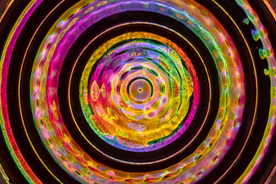 Colorful, abstract circular kaleidoscope pattern with vibrant hues for creative backgrounds.
