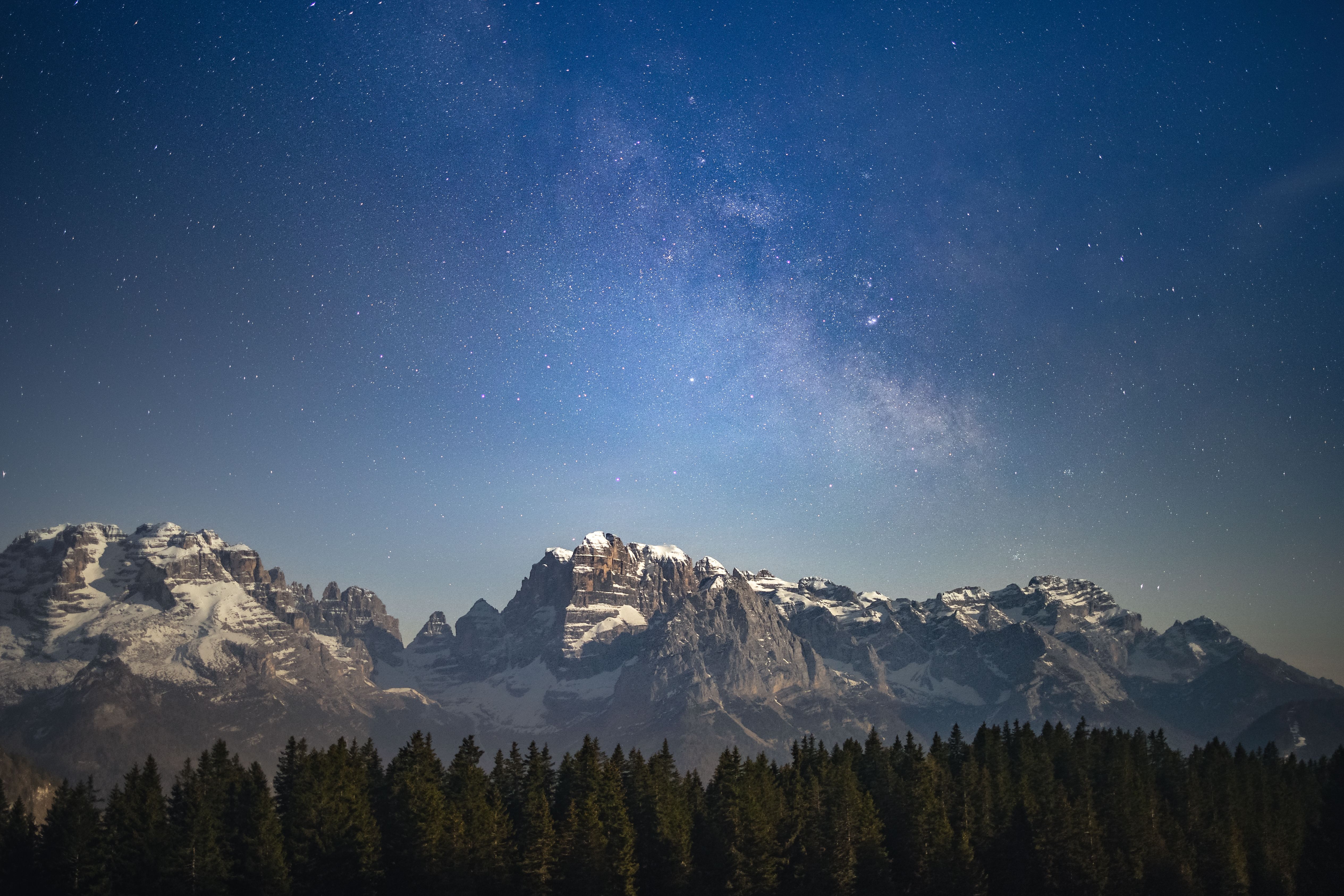 Snow Covered Mountain Under a Starry Sky · Free Stock Photo
