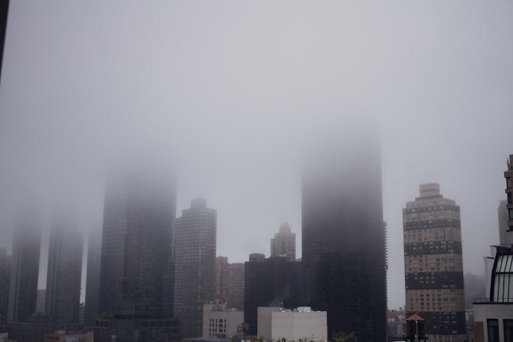 Fog Over Skyscrapers In City