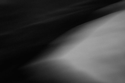 Free Ethereal abstract image featuring smooth black and white gradients with creative blur effects. Stock Photo