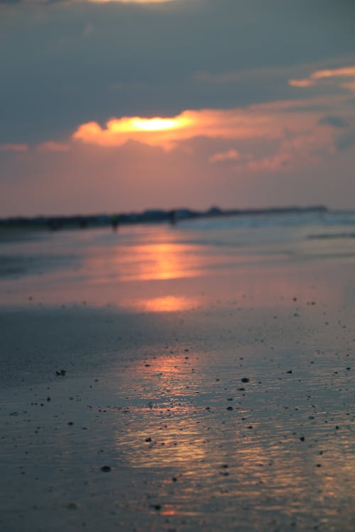 Free A Close-Up Shot of a Wet Sand Stock Photo