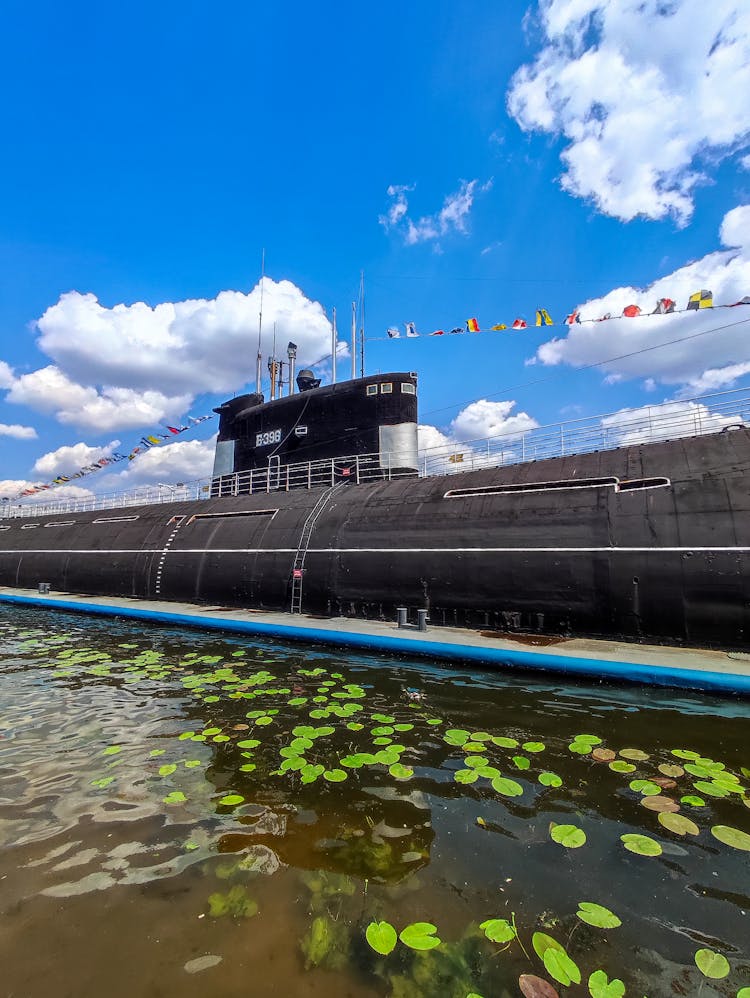 Submarine Decorated With Flags Moored At Pier