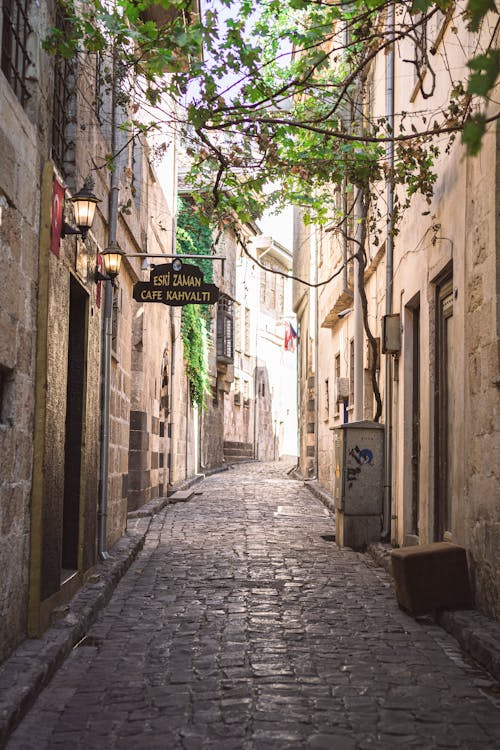 Empty Narrow Alley with Cobblestone in Old Town