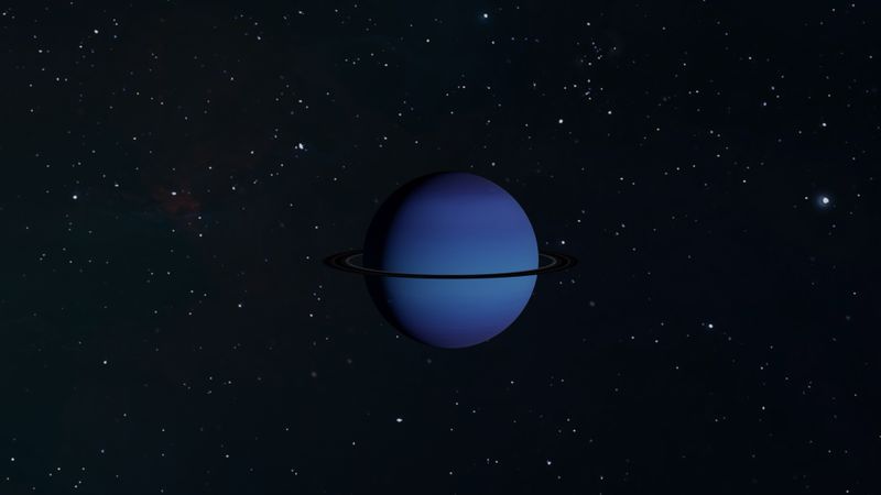 Uranus displaying its rings against a starry backdrop