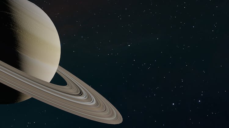 Planet With Rings In Space